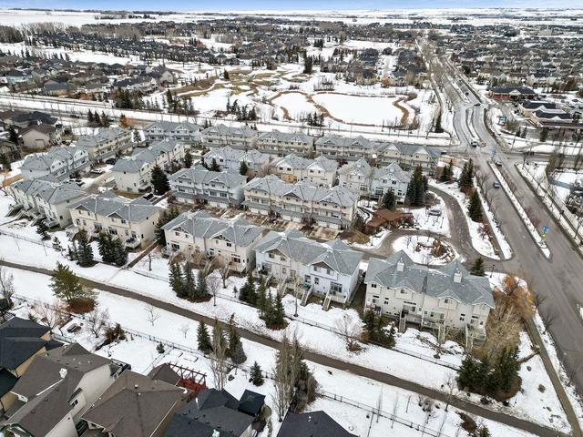 12 Crystal Shores Cove, Home with 2 bedrooms, 2 bathrooms and 2 parking in Calgary AB | Image 38