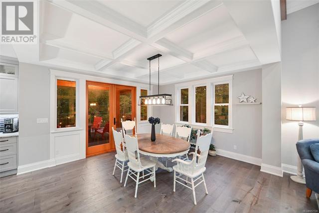 Coffered Ceiling Dining Room, Wood Doors to Deck | Image 9