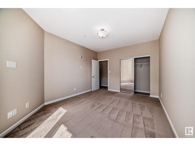310 - 6083 Maynard Wy Nw, Condo with 1 bedrooms, 1 bathrooms and 2 parking in Edmonton AB | Image 25