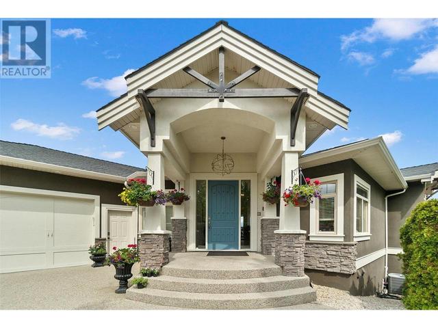 698 Devonian Avenue, House detached with 5 bedrooms, 4 bathrooms and 11 parking in Kelowna BC | Image 2