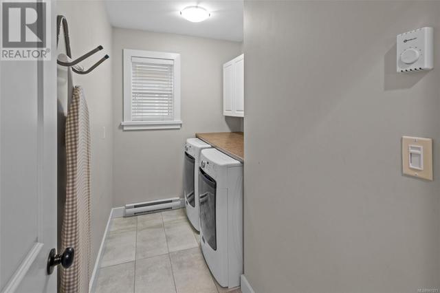 Laundry room conveniently located on the same floor as the bedrooms | Image 19