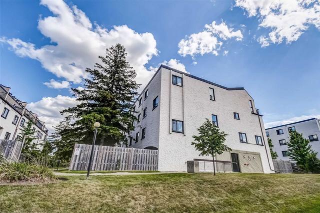 132 - 1058 Falgarwood Dr, Townhouse with 3 bedrooms, 2 bathrooms and 1 parking in Oakville ON | Image 1