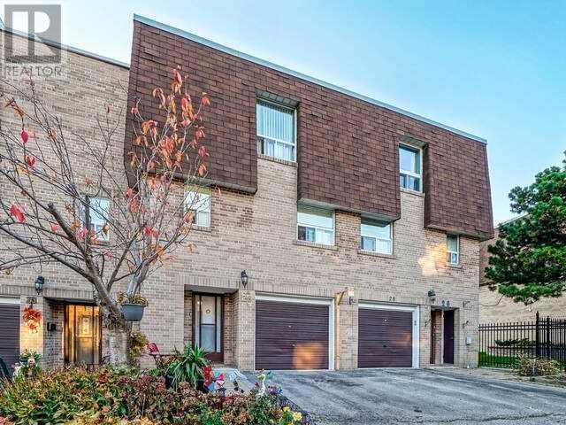 28 Village Green Way, Townhouse with 3 bedrooms, 2 bathrooms and 2 parking in Toronto ON | Image 1