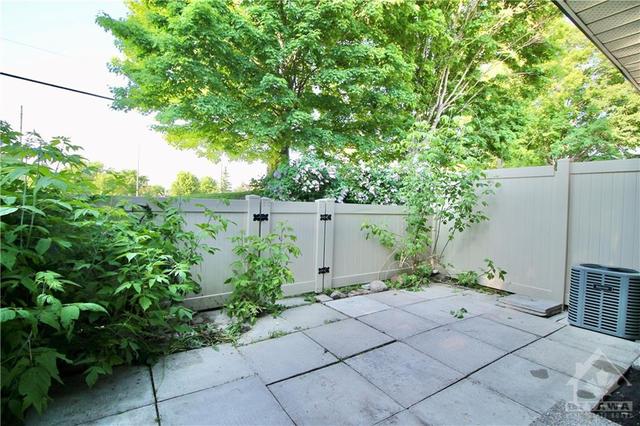 a - 907 Elmsmere Road, Townhouse with 4 bedrooms, 2 bathrooms and 1 parking in Ottawa ON | Image 29