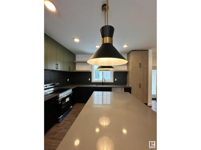 7744 Yorke Me Nw Nw, House attached with 4 bedrooms, 3 bathrooms and 4 parking in Edmonton AB | Image 8