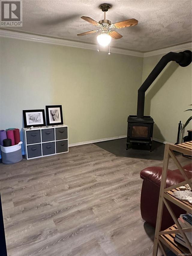 Family room wood stove- Lower floor | Image 30
