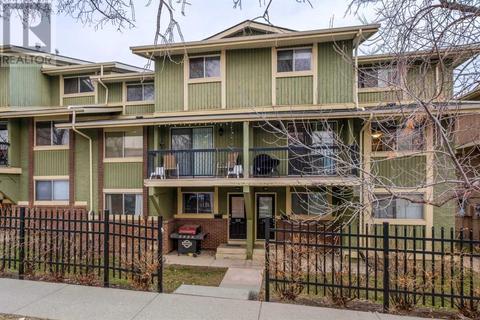 1211, - 2200 Woodview Drive Sw, House attached with 2 bedrooms, 1 bathrooms and 1 parking in Calgary AB | Card Image