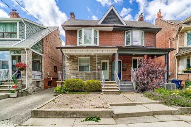 206 Gillard Ave, House semidetached with 2 bedrooms, 3 bathrooms and 2 parking in Toronto ON | Image 1