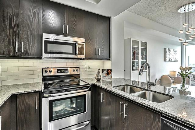 928 - 15 James Finlay Way, Condo with 1 bedrooms, 2 bathrooms and 1 parking in Toronto ON | Image 2
