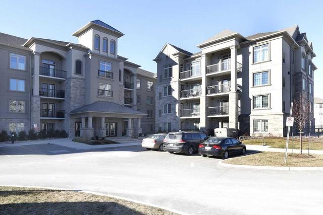 106 - 1440 Main St E, Condo with 2 bedrooms, 2 bathrooms and 2 parking in Milton ON | Image 1