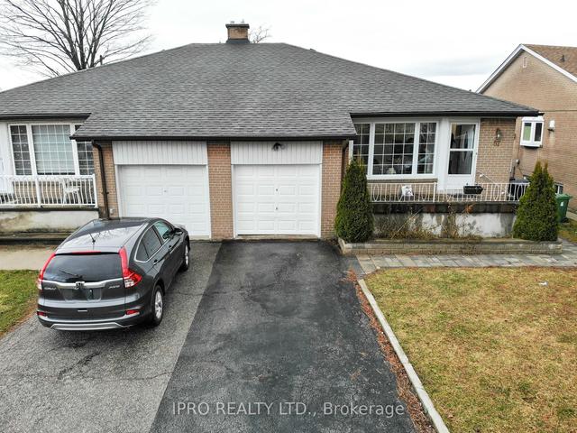 57 Combermere Dr, House semidetached with 3 bedrooms, 2 bathrooms and 3 parking in Toronto ON | Image 1