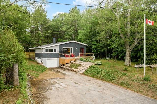 1988 Champlain Rd, House detached with 4 bedrooms, 3 bathrooms and 7 parking in Tiny ON | Image 1