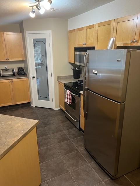 220 - 1648 Saamis Drive Nw, Condo with 2 bedrooms, 2 bathrooms and 2 parking in Medicine Hat AB | Image 4