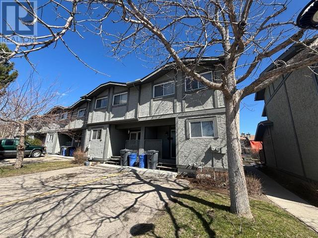 151, - 7172 Coach Hill Road Sw, House attached with 3 bedrooms, 1 bathrooms and 1 parking in Calgary AB | Image 1
