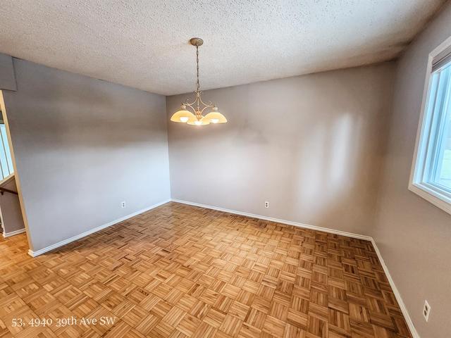 53 - 4940 39 Avenue Sw, Home with 3 bedrooms, 1 bathrooms and 1 parking in Calgary AB | Image 13