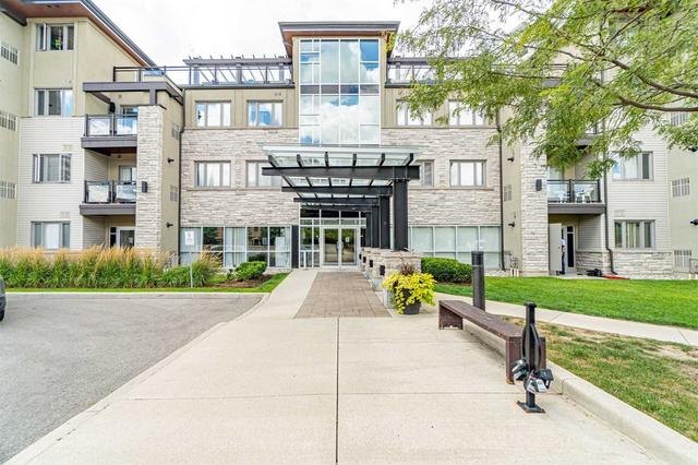 215 - 570 Lolita Gdns, Condo with 2 bedrooms, 2 bathrooms and 1 parking in Mississauga ON | Image 1