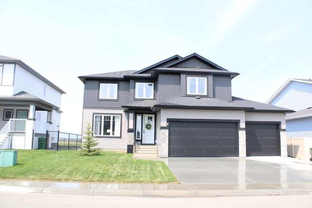 4 Coutts Close, House detached with 3 bedrooms, 2 bathrooms and 3 parking in Olds AB | Image 2