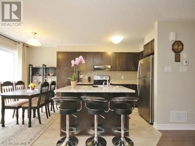 555 Petrichor Cres, House attached with 3 bedrooms, 3 bathrooms and 3 parking in Ottawa ON | Image 4