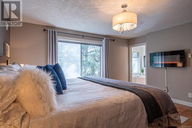 658 Rason Rd, House detached with 5 bedrooms, 4 bathrooms and 5 parking in Langford BC | Image 37