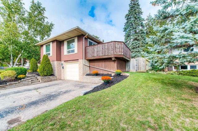 Located in family friendly Doon neighbourhood and on a street that rarely sees homes come up for sale - Summer shot | Image 34