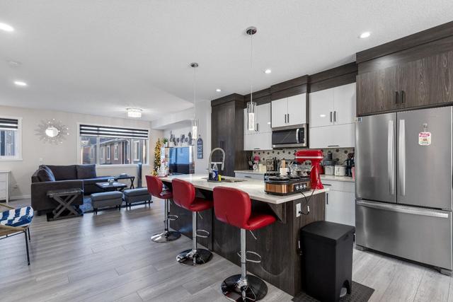 403 - 11428 52 Street Ne, Home with 4 bedrooms, 4 bathrooms and 2 parking in Calgary AB | Image 3