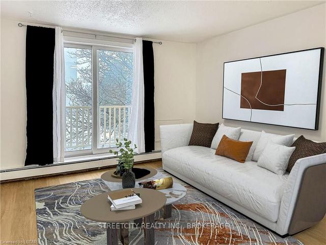 305 - 1590 Ernest Ave, Townhouse with 2 bedrooms, 1 bathrooms and 2 parking in London ON | Image 2