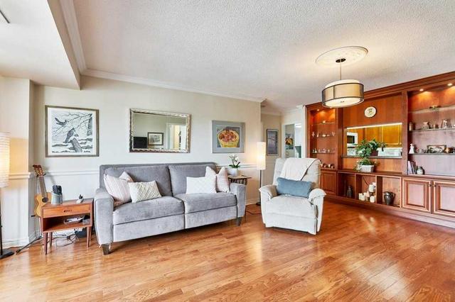 310 - 452 Scarborough Golf Clu Rd, Condo with 2 bedrooms, 2 bathrooms and 1 parking in Toronto ON | Image 2