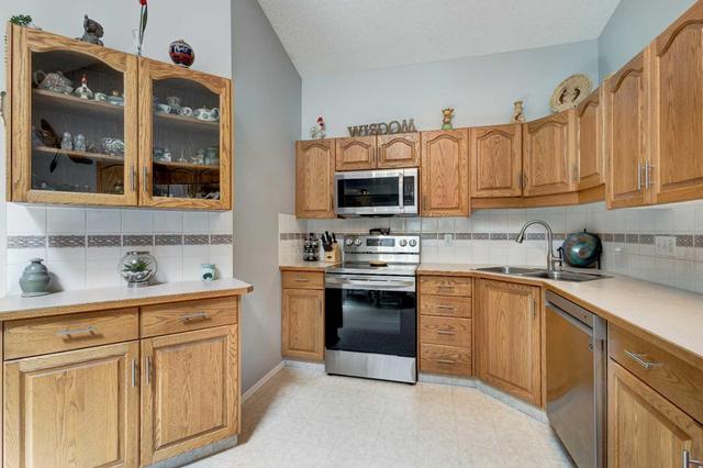 144 Baker Creek Drive Sw, Home with 4 bedrooms, 2 bathrooms and 4 parking in High River AB | Image 10