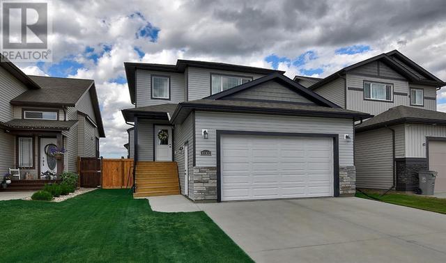 10302 127 Avenue, House detached with 3 bedrooms, 2 bathrooms and 4 parking in Grande Prairie AB | Card Image