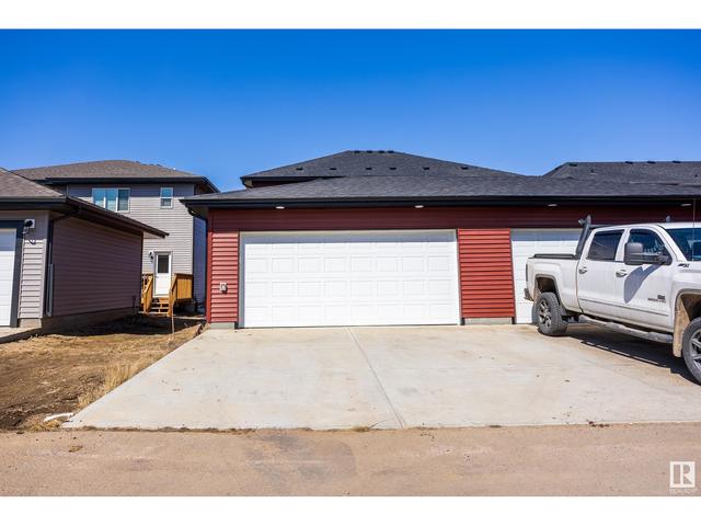 9809 107 Av, House semidetached with 3 bedrooms, 2 bathrooms and null parking in Morinville AB | Image 41