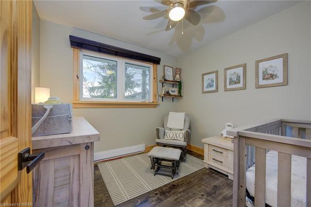 Large kitchen with granite counters, stainless steel appliances, laundry and access to back deck and yard | Image 7