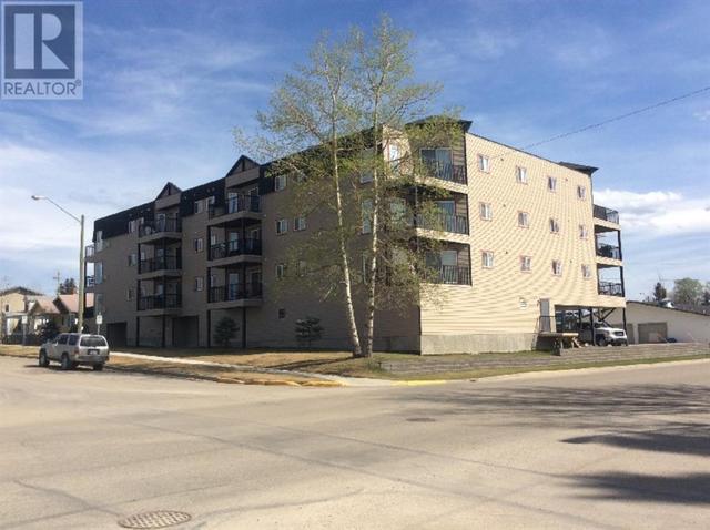 303, - 5037 7 Avenue, Condo with 2 bedrooms, 2 bathrooms and 1 parking in Edson AB | Image 1