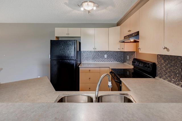 7204 - 304 Mackenzie Way Sw, Condo with 2 bedrooms, 1 bathrooms and 1 parking in Calgary AB | Image 7