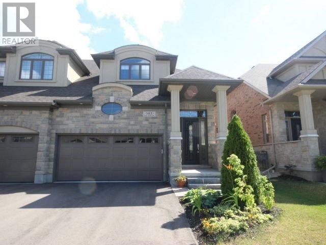 143 Oak Park Dr, House attached with 3 bedrooms, 3 bathrooms and 2 parking in Waterloo ON | Image 1