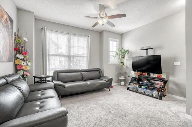 10 New Brighton Point Se, Home with 2 bedrooms, 2 bathrooms and 3 parking in Calgary AB | Image 4