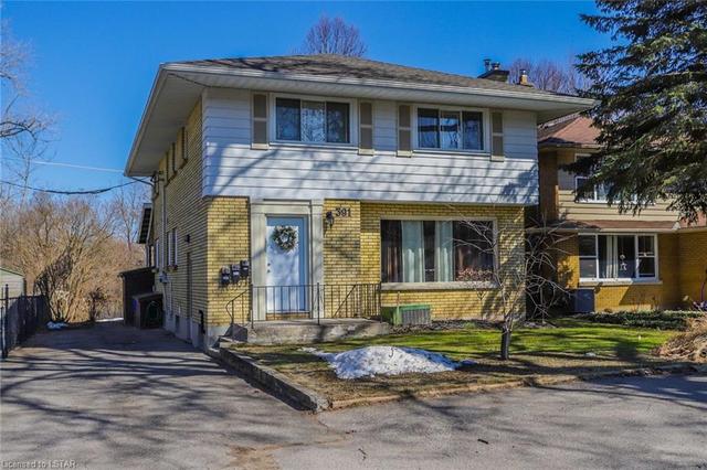 391 Wharncliffe Road N, House detached with 7 bedrooms, 3 bathrooms and 12 parking in London ON | Image 1