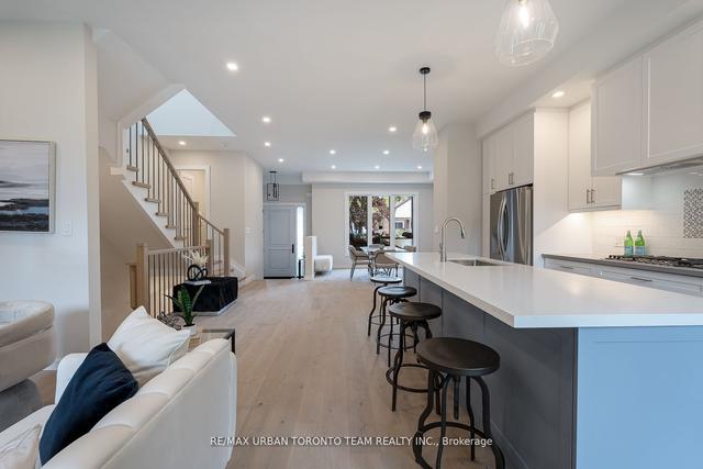 26 Kalmar Ave, House detached with 4 bedrooms, 4 bathrooms and 3 parking in Toronto ON | Image 3