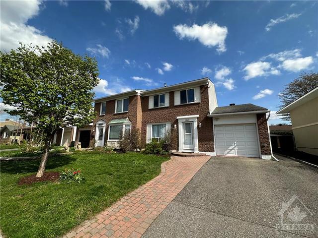 1360 Cahill Drive, Home with 4 bedrooms, 3 bathrooms and 3 parking in Ottawa ON | Image 1