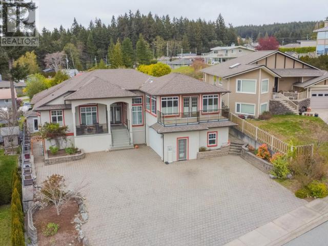 6929 Retaskit Crt, House detached with 5 bedrooms, 4 bathrooms and 2 parking in Powell River BC | Image 48