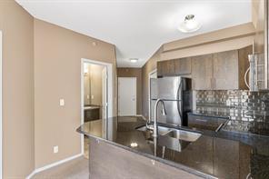 504 - 325 3 Street Se, Condo with 2 bedrooms, 2 bathrooms and 1 parking in Calgary AB | Image 2