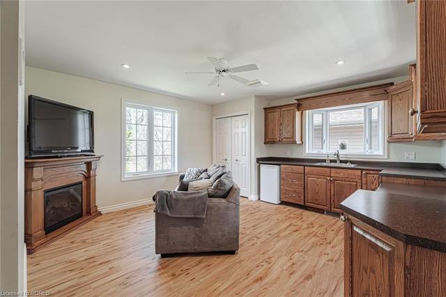 Main floor family room with access to large rear deck | Image 36