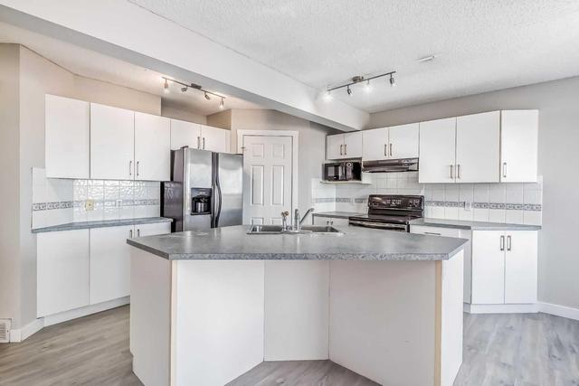 50 Hidden Ranch Terrace, House detached with 3 bedrooms, 2 bathrooms and 4 parking in Calgary AB | Image 4