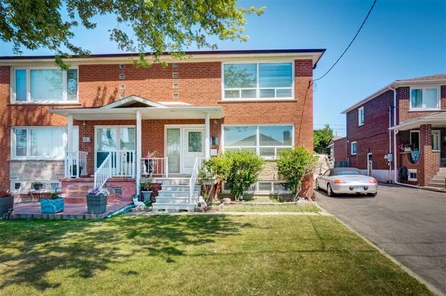 56 Kanarick Cres, House semidetached with 3 bedrooms, 2 bathrooms and 4 parking in Toronto ON | Card Image