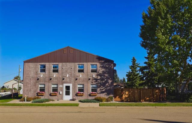 312 Main Street, House detached with 4 bedrooms, 2 bathrooms and 4 parking in Camrose County AB | Image 1