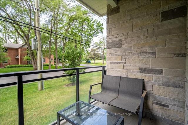 102 - 320 Plains Rd E, Condo with 1 bedrooms, 1 bathrooms and 2 parking in Burlington ON | Image 7
