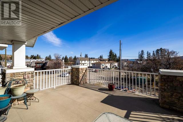 408, - 128 Centre Avenue, Condo with 2 bedrooms, 2 bathrooms and 1 parking in Cochrane AB | Image 37