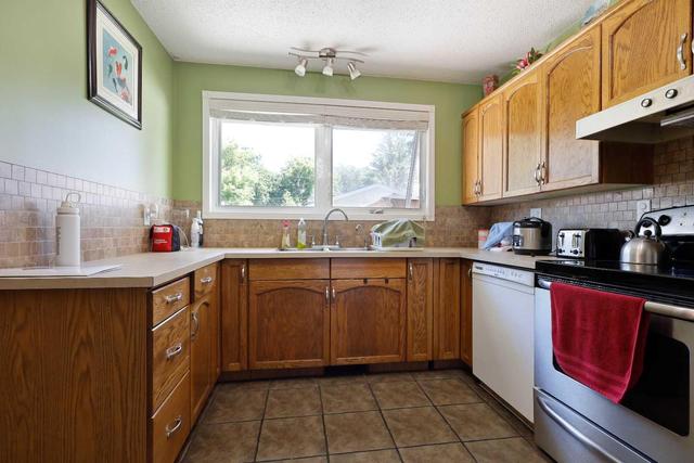 412 4 Street W, House detached with 4 bedrooms, 2 bathrooms and 3 parking in Brooks AB | Image 12
