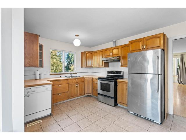 5697 248 Street, House detached with 4 bedrooms, 3 bathrooms and 10 parking in Langley BC | Image 13
