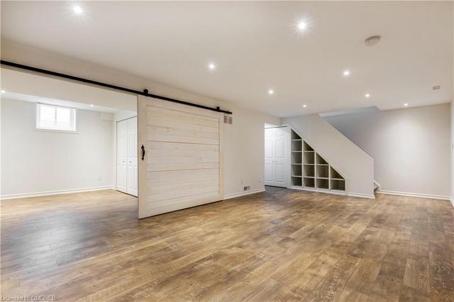 Rec room with laminate flooring | Image 22
