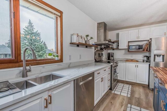 85 Edgeland Road Nw, Home with 2 bedrooms, 2 bathrooms and 4 parking in Calgary AB | Image 11